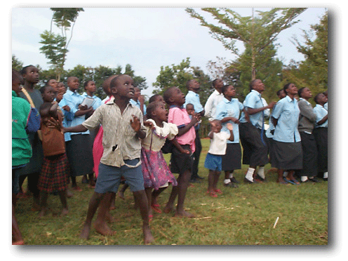 Children watch a water-rocket launch