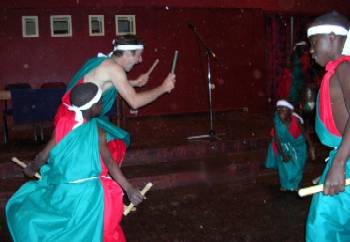 Kevin Hand dances with Burundian Children