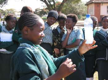 A student studies Oil, Water and Soap