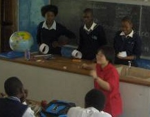 Students count using strips of paper